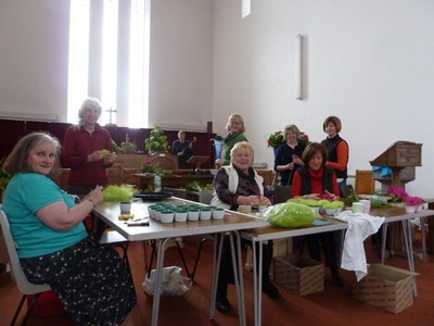 Members prepare cupcakes