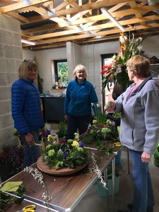 The girls working on the table arrangements 